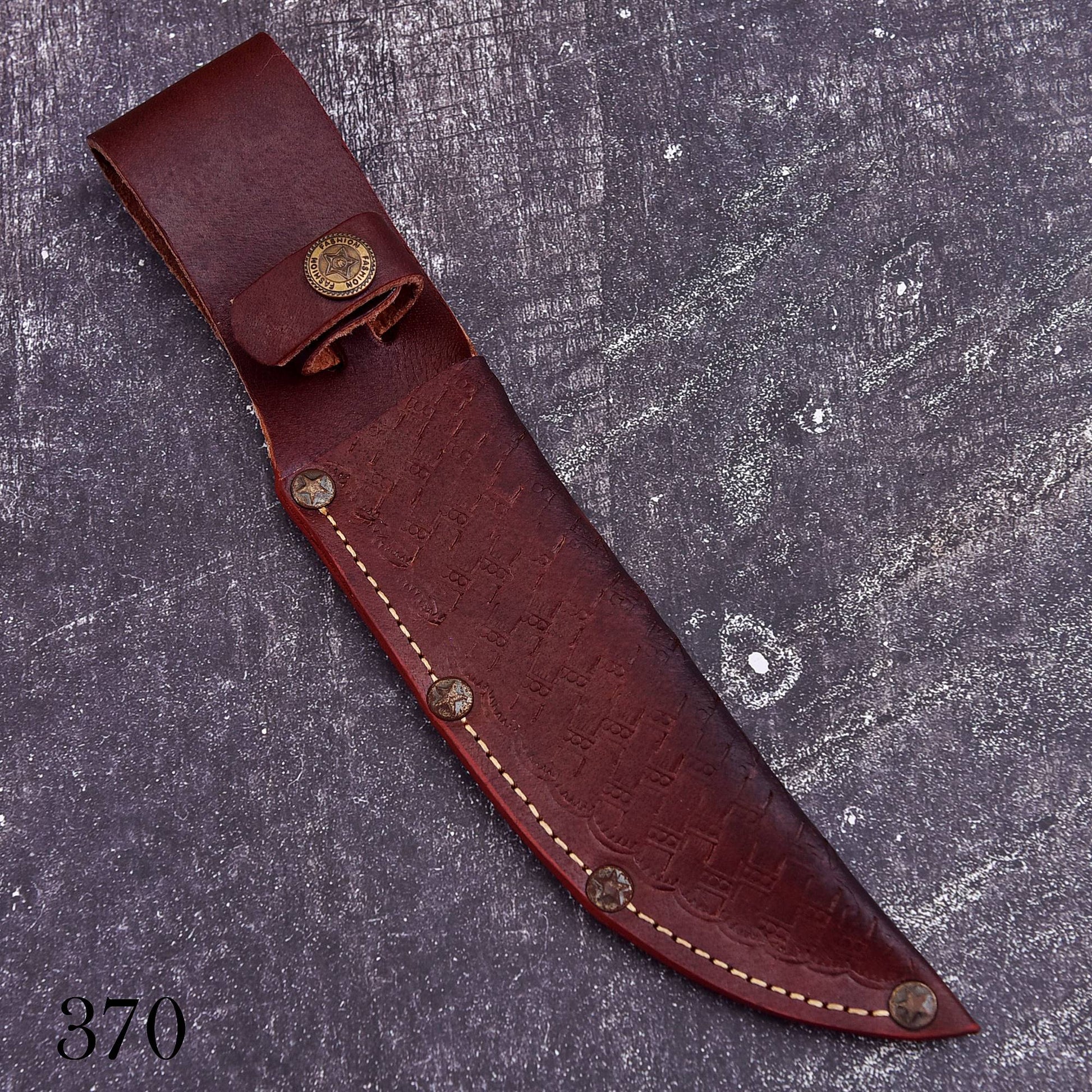 A dark reddish-brown leather knife sheath with a textured embossed pattern, cream-colored stitching, and brass snap fasteners, displayed diagonally on a textured gray background.