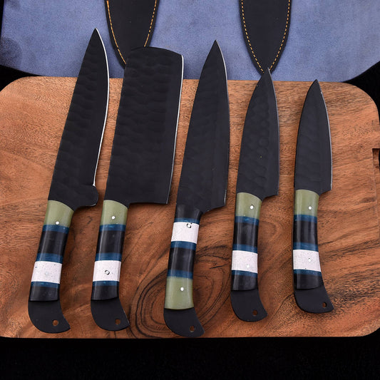Five-piece handmade black chef knife set with hammered blades, multicolor handles and protective leather sheaths