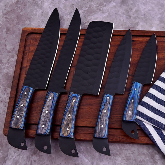 Five-piece handmade black chef knife set with blue wood handles, vegetable cleaver and protective leather sheaths